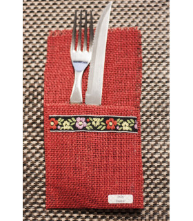 Punane söögitarvikute hoidja